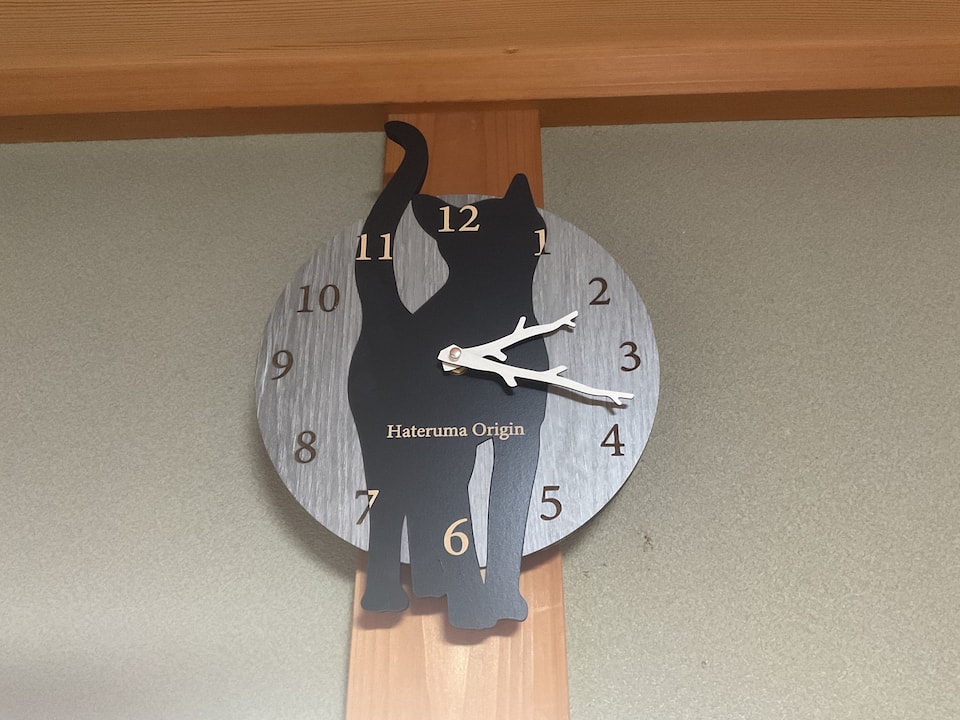 黒猫の掛け時計